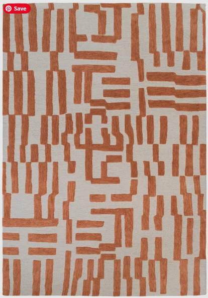 An area rug with a modern geometric pattern of terracotta-colored vertical and horizontal rectangular blocks on a light beige textured background. A red 'Save' badge is visible in the top-left corner.