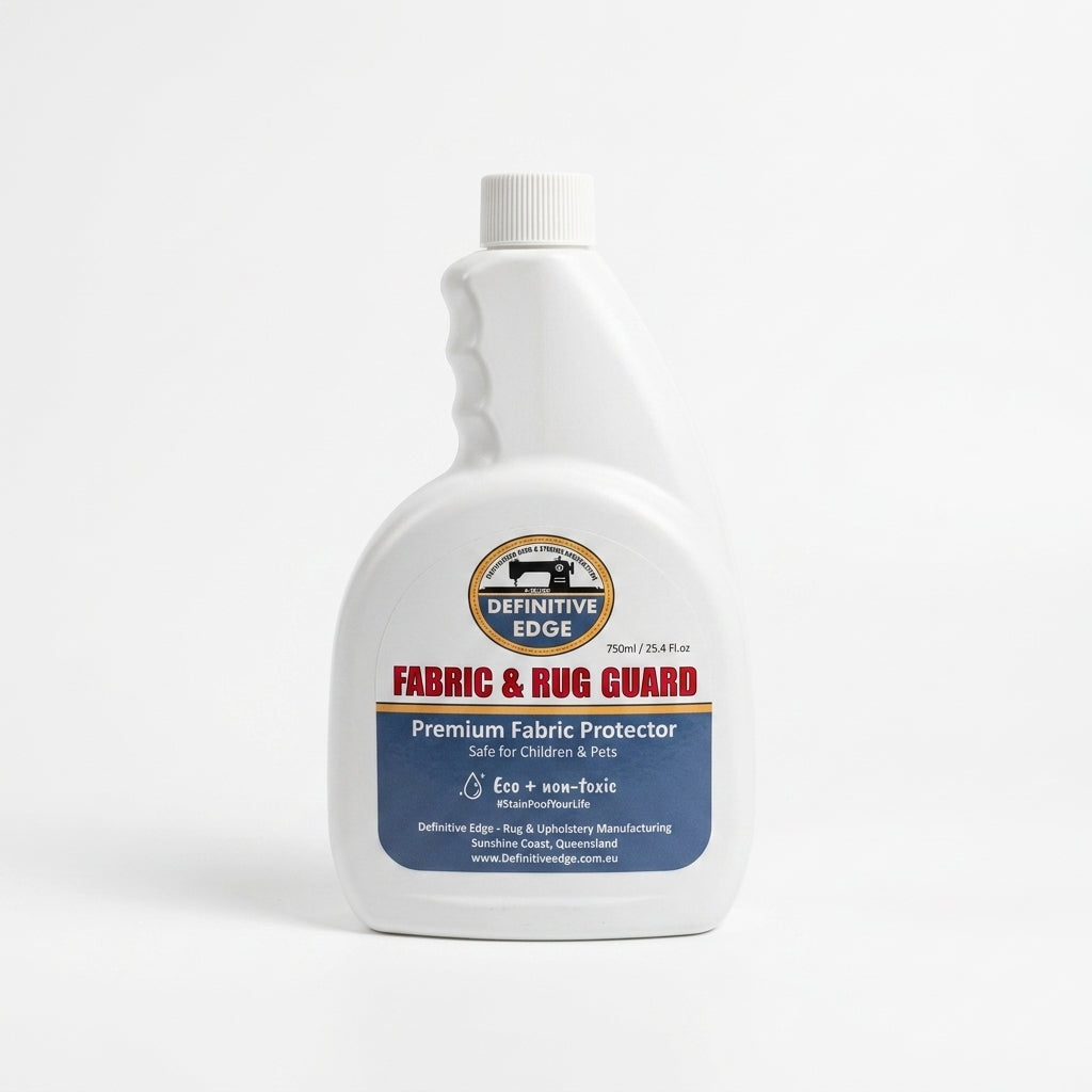 Fabric and rug guard spray bottle with Definitive Edge label on a white background