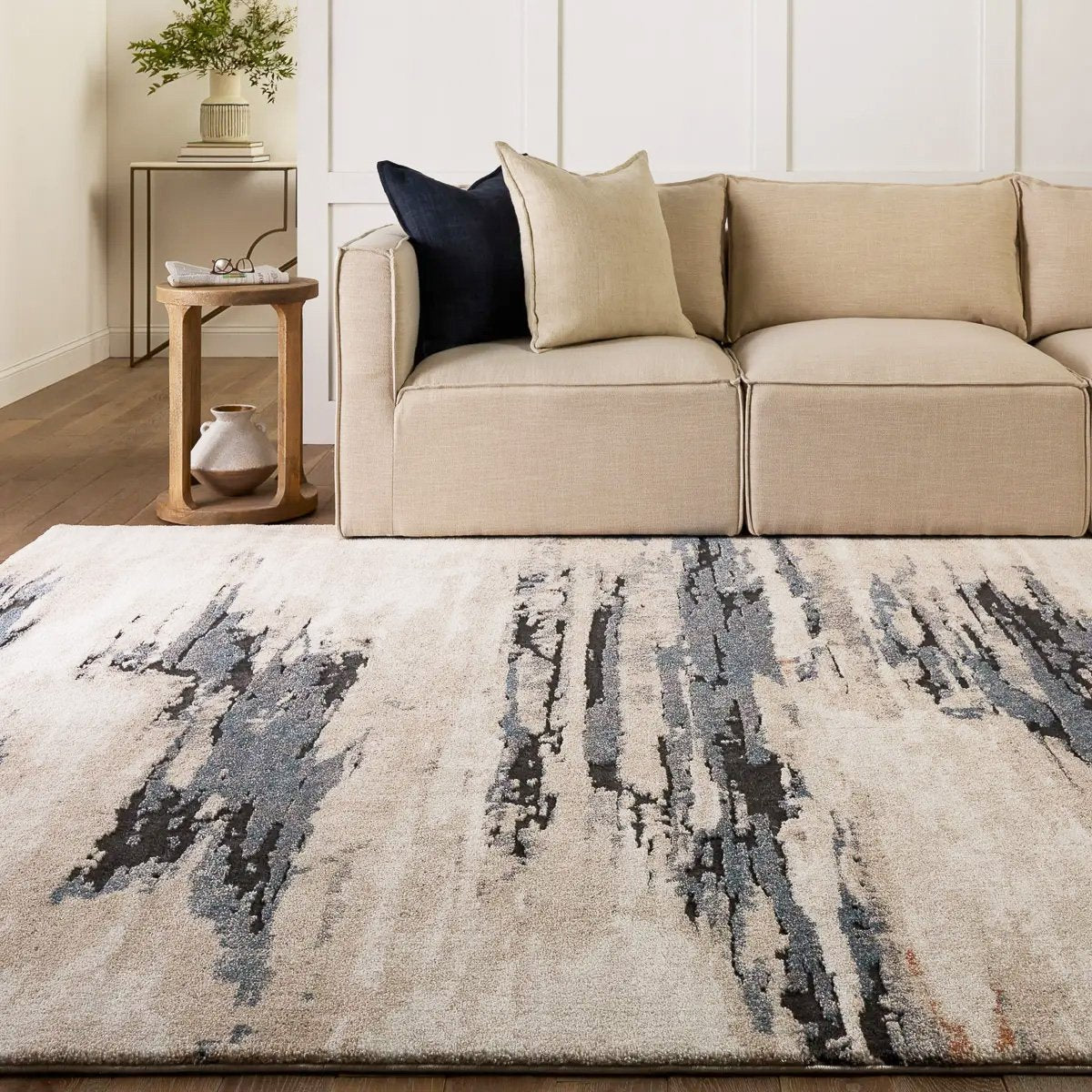 The Formation Polar Rug displayed in a living room, showcasing its versatility and modern appeal.
