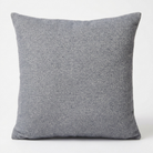 A square throw pillow in a textured gray woven fabric, shown against a plain white background.