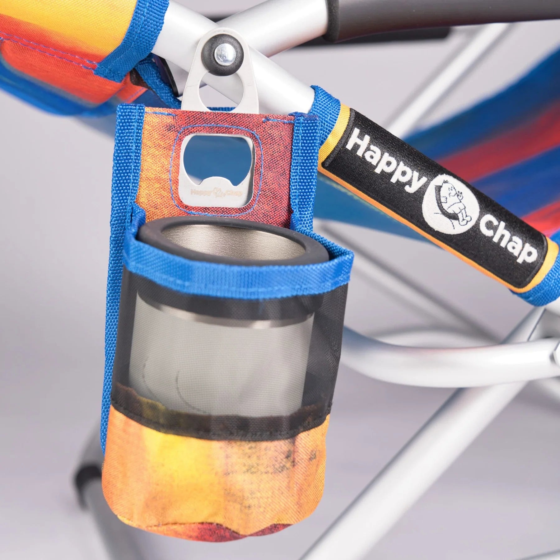 Colorful bike drink holder with a bottle opener attached to a bicycle frame, featuring 'Happy Chap' branding.