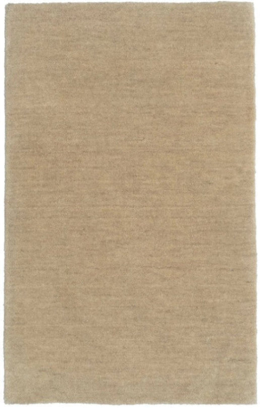 A beige, textured wool rug with a subtle tie-dye effect, displayed on a plain background.