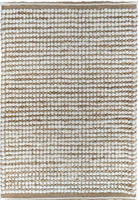 Focusing on the hand-woven details, this image captures the skilled craftsmanship of the rug and the striking contrast between the natural jute and white wool, illustrating the rug's quality and aesthetic appeal.