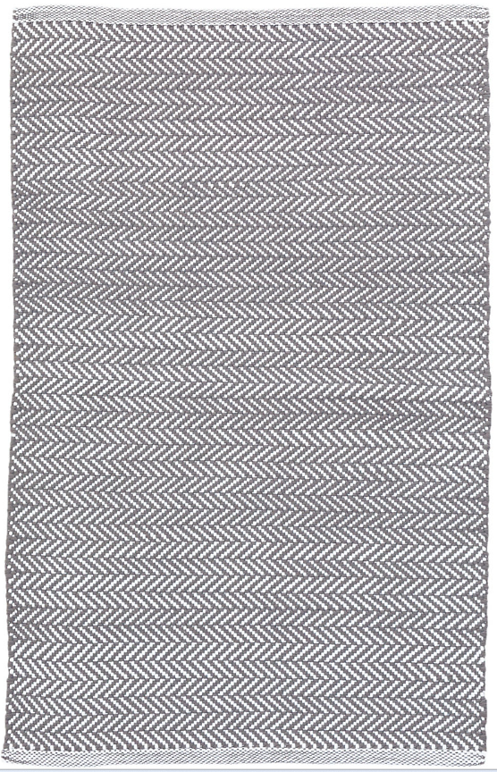 Gray and white chevron patterned rug