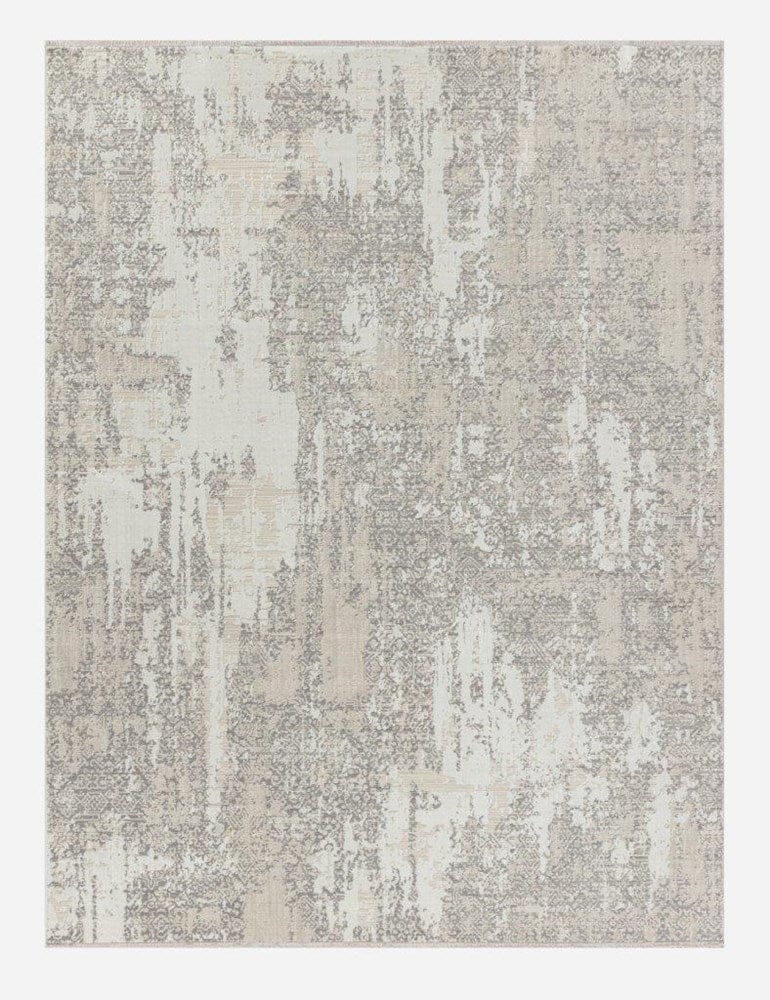 Textured area rug with a neutral color palette on a white background