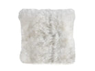 White sheepskin cushion pillow on a white background
