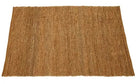 Brown woven mat on a white background