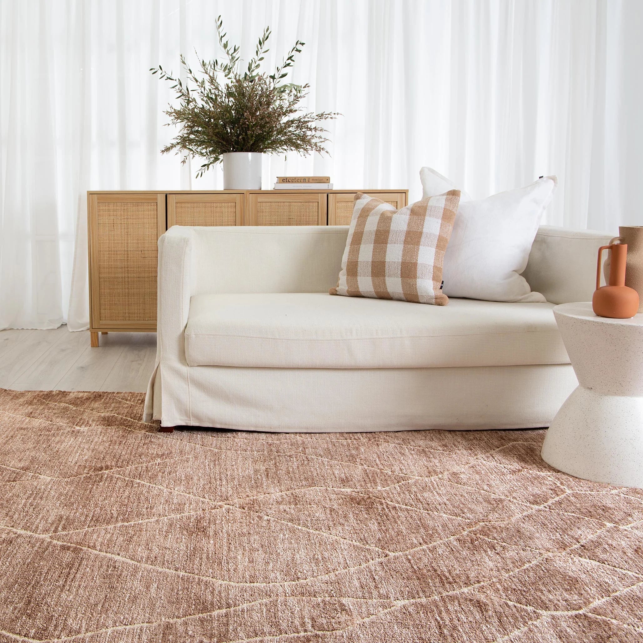 Kendra Rug elegantly placed in a room, demonstrating its adaptability and charm in a home environment.