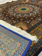 Close-up of intricately patterned rugs with vibrant colors.