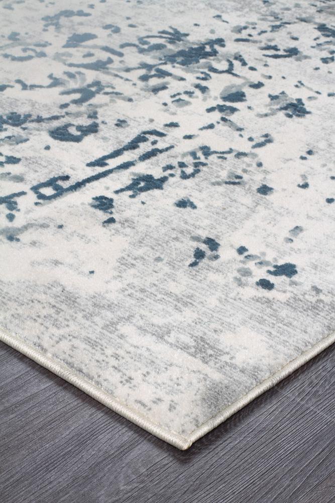 Close-up view of the edge of the Kendra Grey Rug, highlighting the precision of its power-loomed construction.