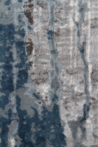 Zoomed-in view showing the intricate texture and rich blue tones of the Kendra Rug, illustrating its unique aesthetic appeal.