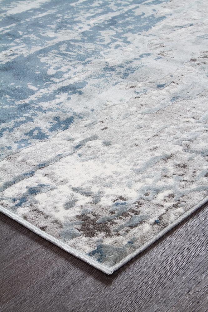 Detailed close-up highlighting the texture of the Kendra Rug in Blue, emphasizing its high-low pile and quality blend of materials.