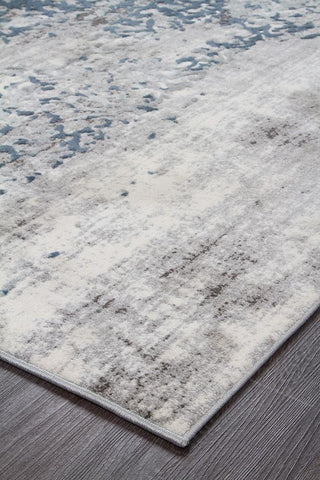 Detailed close-up showing the soft, subtle texture and high-low pile of the Kendra White Rug, highlighting its quality blend of materials.