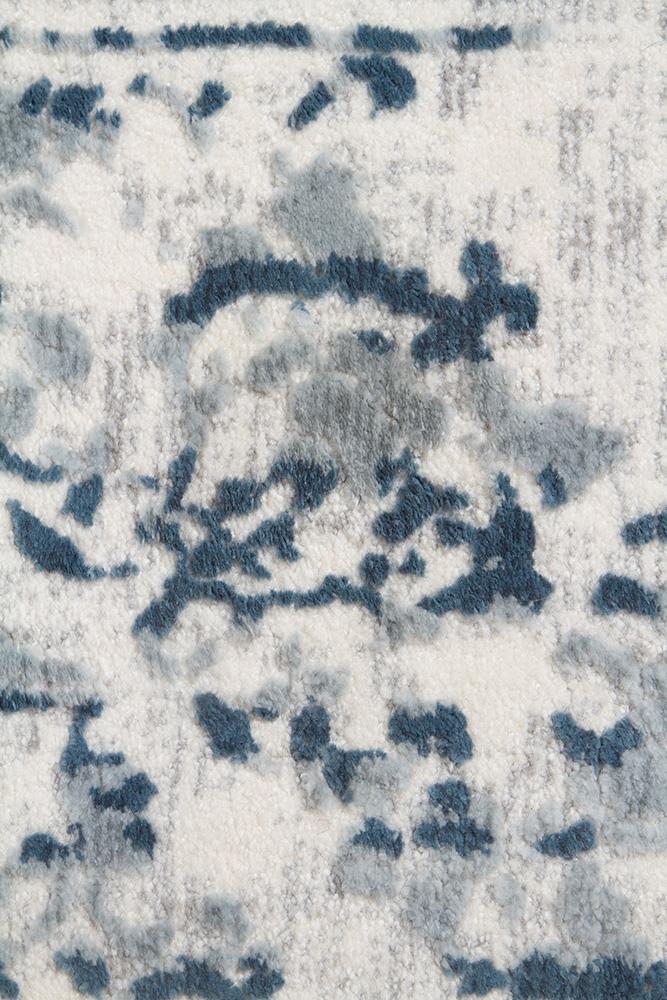 Zoomed-in image of the Kendra White Rug's low shed pile, illustrating its 10mm pile height and durable construction.