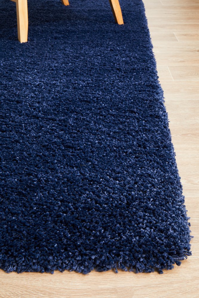 Zoomed-in view showing the intricate texture and non-shedding fibers of the Laguna Rug in Denim.