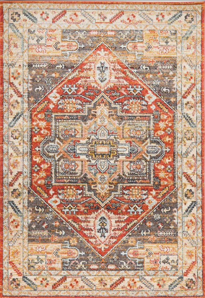 Complete image of the Legacy Rug in a rich Terracotta shade, displaying its tribal-inspired geometrical patterns.