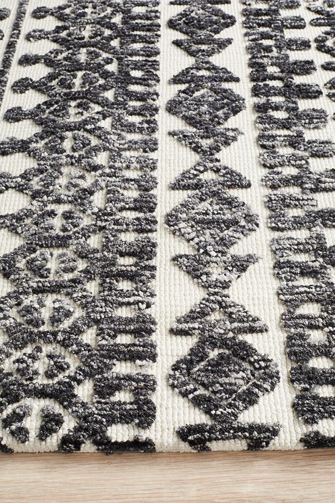 Zoomed-in view showcasing the thick, plush texture of the Noosa Rug's Levi in Ivory Black, reflecting its comfortable and luxurious feel.