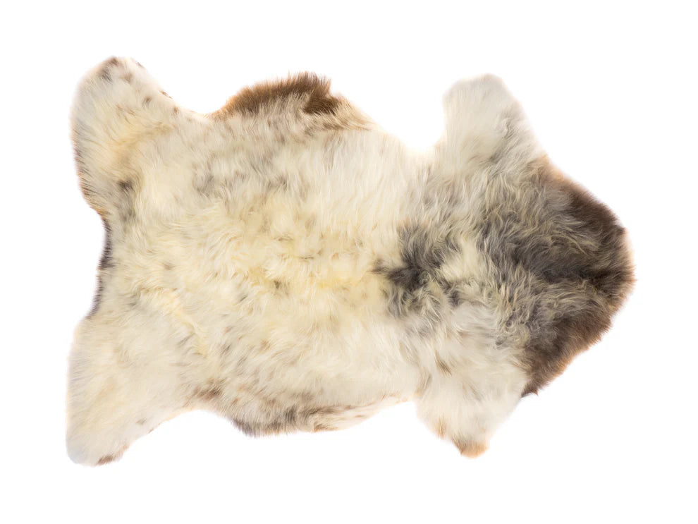 Fur rug with natural pattern on a white background