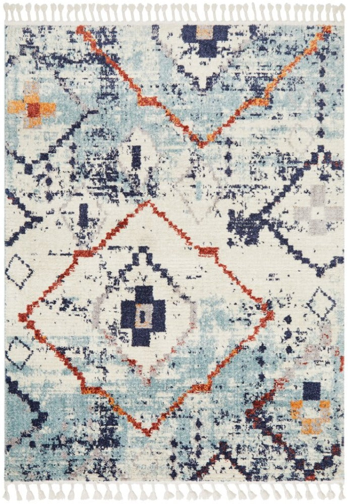 Showcasing the intricate geometric patterns and the deep blue color of the Marrakesh rug, highlighting its unique bohemian appeal.