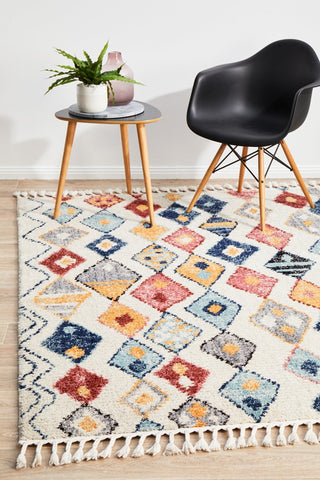 The Marrakesh Rug in Multi, adding a burst of colour and bohemian flair to a contemporary room setting.