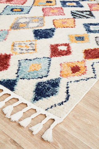 Detailed close-up highlighting the vivid and diverse tribal patterns on the Marrakesh Rug in Multi.