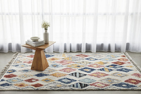 The Marrakesh Rug in Multi under natural lighting, highlighting the richness and depth of its multicoloured design.