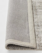 Angle shot focusing on the luxurious and soft surface of the rug, ideal for low-traffic areas in the home.