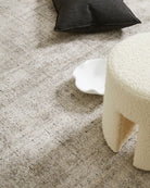 Photograph of the rug in a room setting, illustrating how it complements modern furniture and interior design styles.