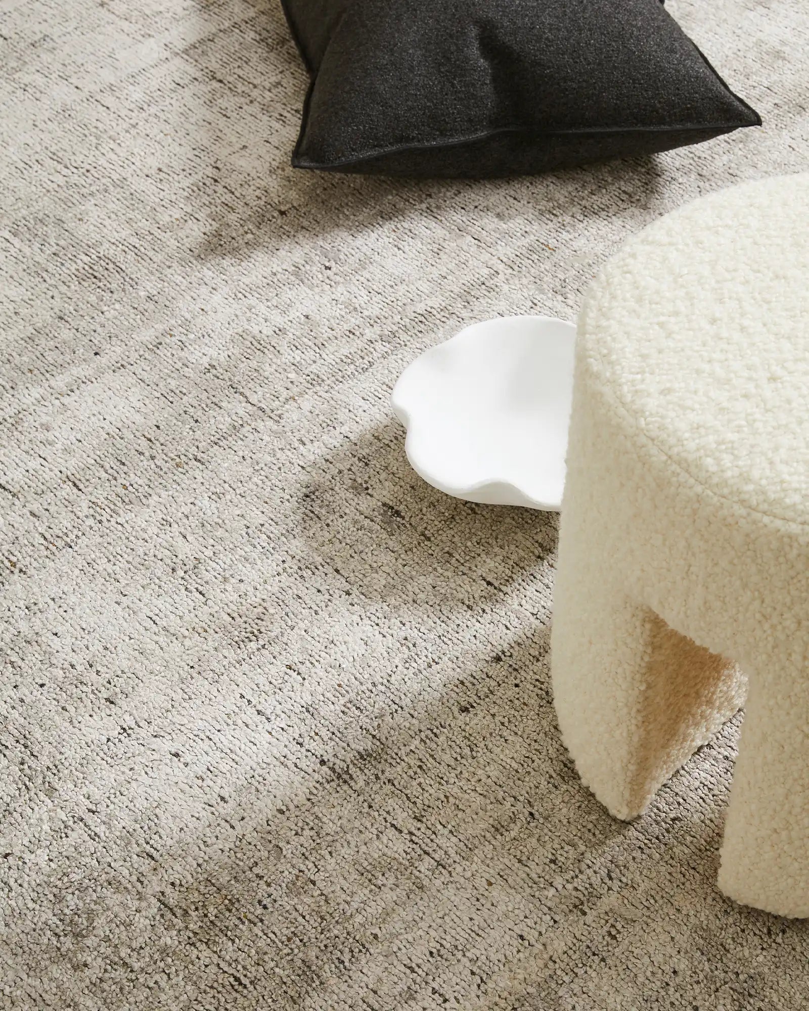 Photograph of the rug in a room setting, illustrating how it complements modern furniture and interior design styles.