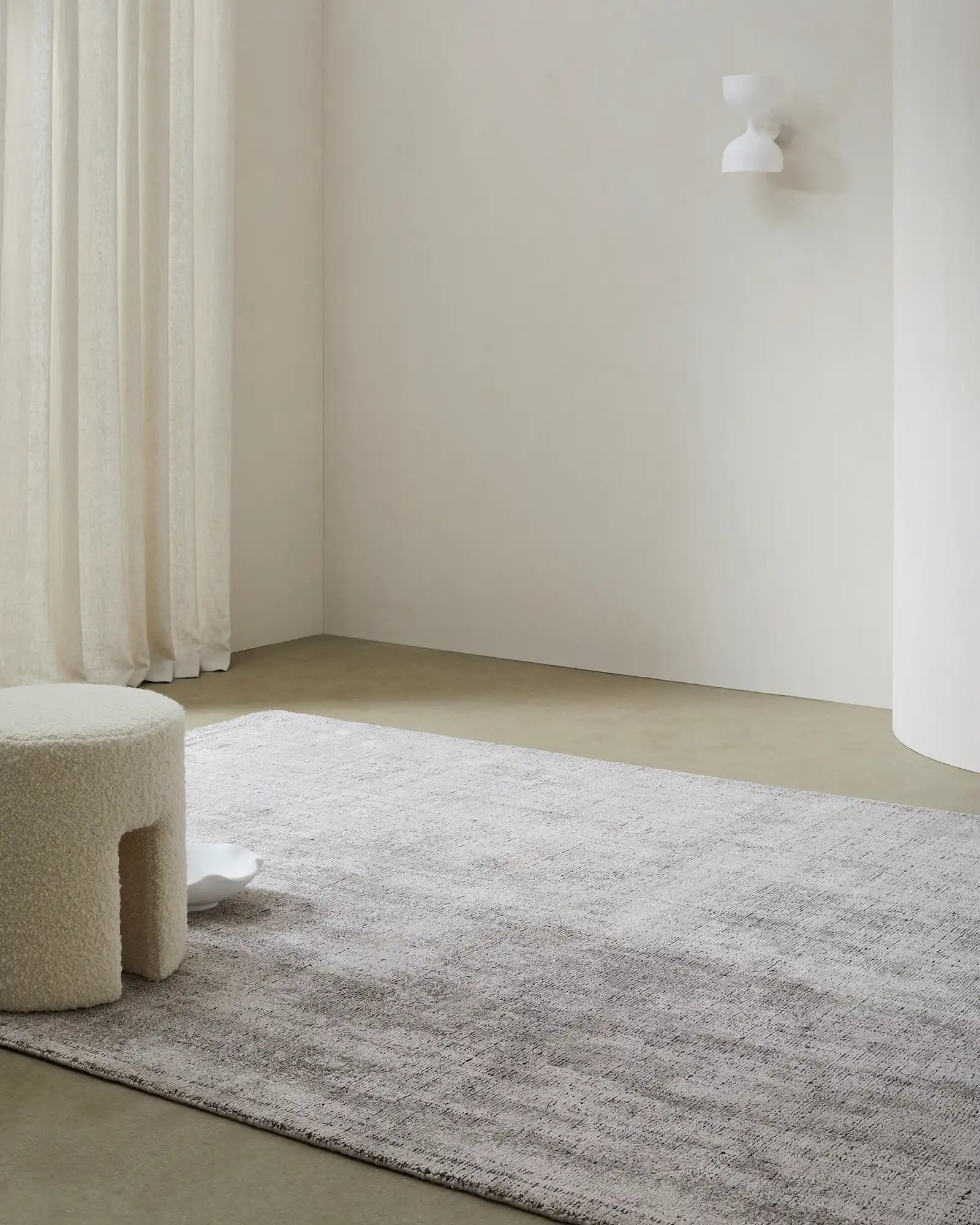Display of the rug's size and scale in a living space, demonstrating its versatility for different room sizes.