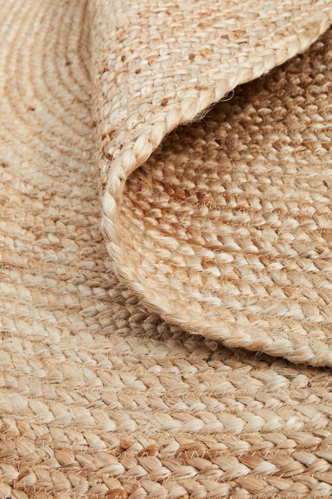 Close-up of a woven beige jute rug