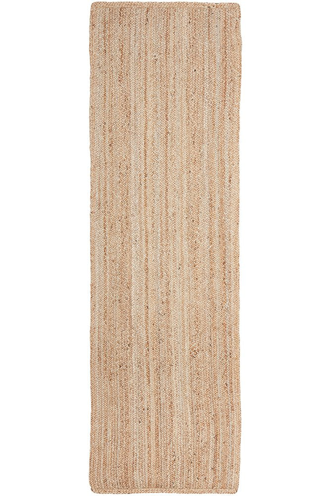 Beige woven rug on a white background
