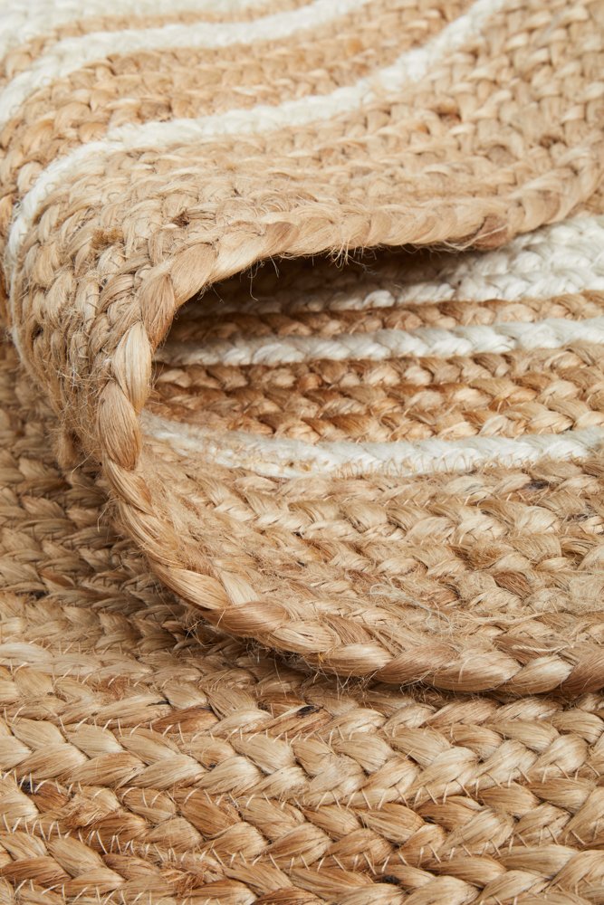 Close-up of woven jute rope with natural beige color.