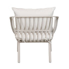 A modern outdoor armchair with a light gray metal frame and white cushions, shown from the back against a plain white background.