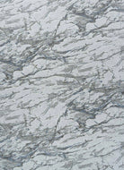 Close-up of a textured gray surface with subtle patterns