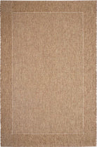 Beige area rug with a subtle pattern on a plain background
