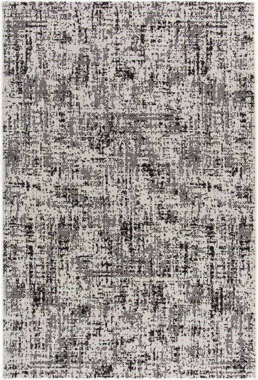 A square area rug with an abstract distressed pattern in shades of gray, black, and off-white.