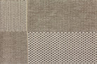 Textured woven pattern in shades of brown and beige