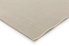 Close-up of a beige textured fabric on a white background