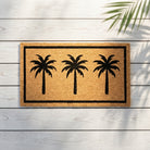 Doormat with palm tree design on a wooden floor