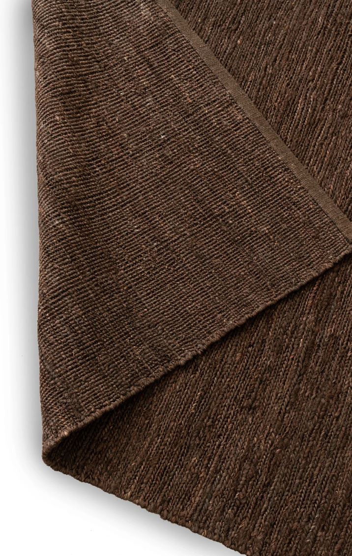 Close-up of brown fabric with a textured pattern