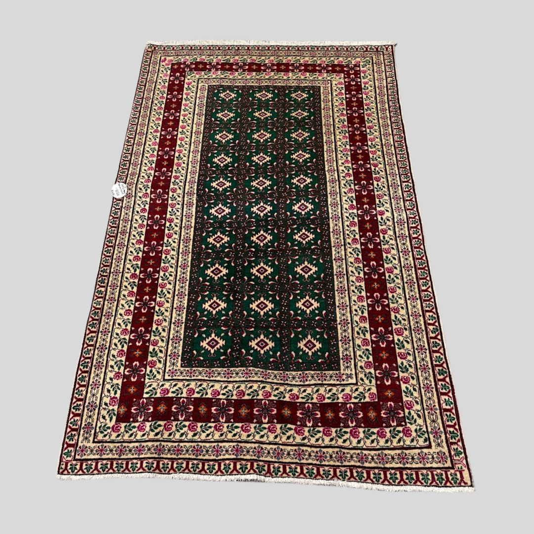 Decorative rug with intricate patterns on a plain background