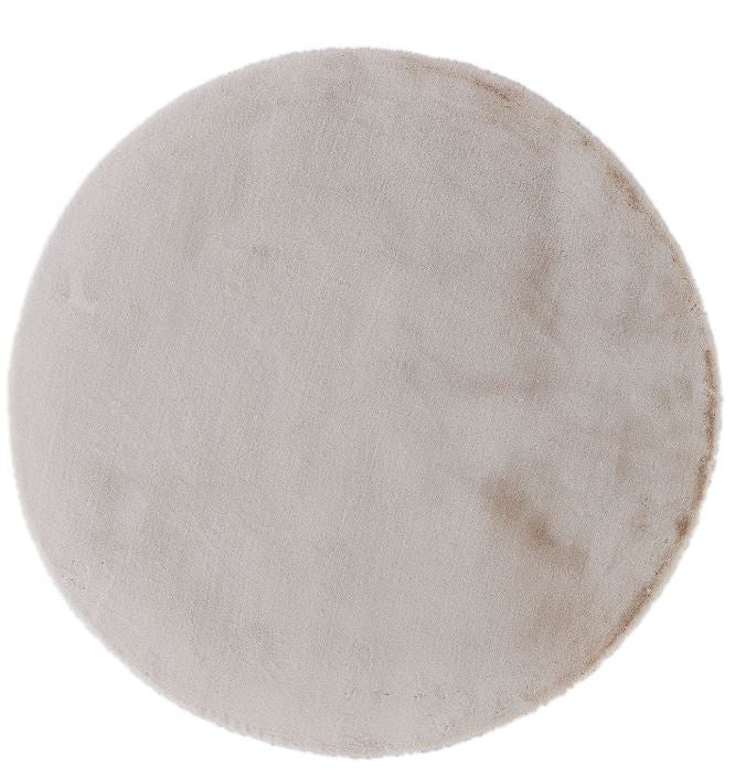 Round beige rug on a white background