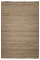 Beige area rug with a textured pattern on a white background