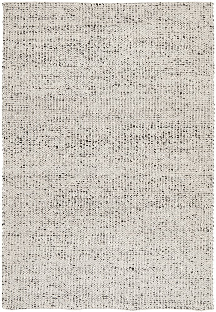 A grey wool area rug with a flatweave design and hand loomed construction.
