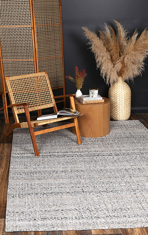 Salar Gunj Collection Anthra rug in a cozy reading nook, adding warmth and style to the intimate space.