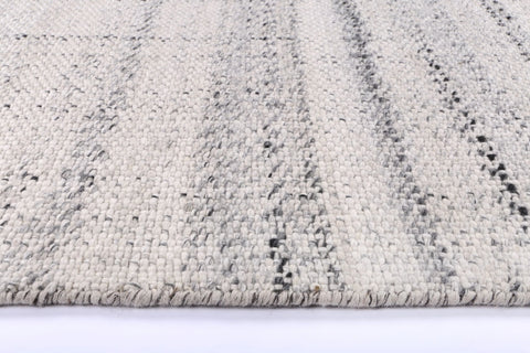 Elegant smoke hue of the Salar Gunj rug adding depth and sophistication to a minimalist space.