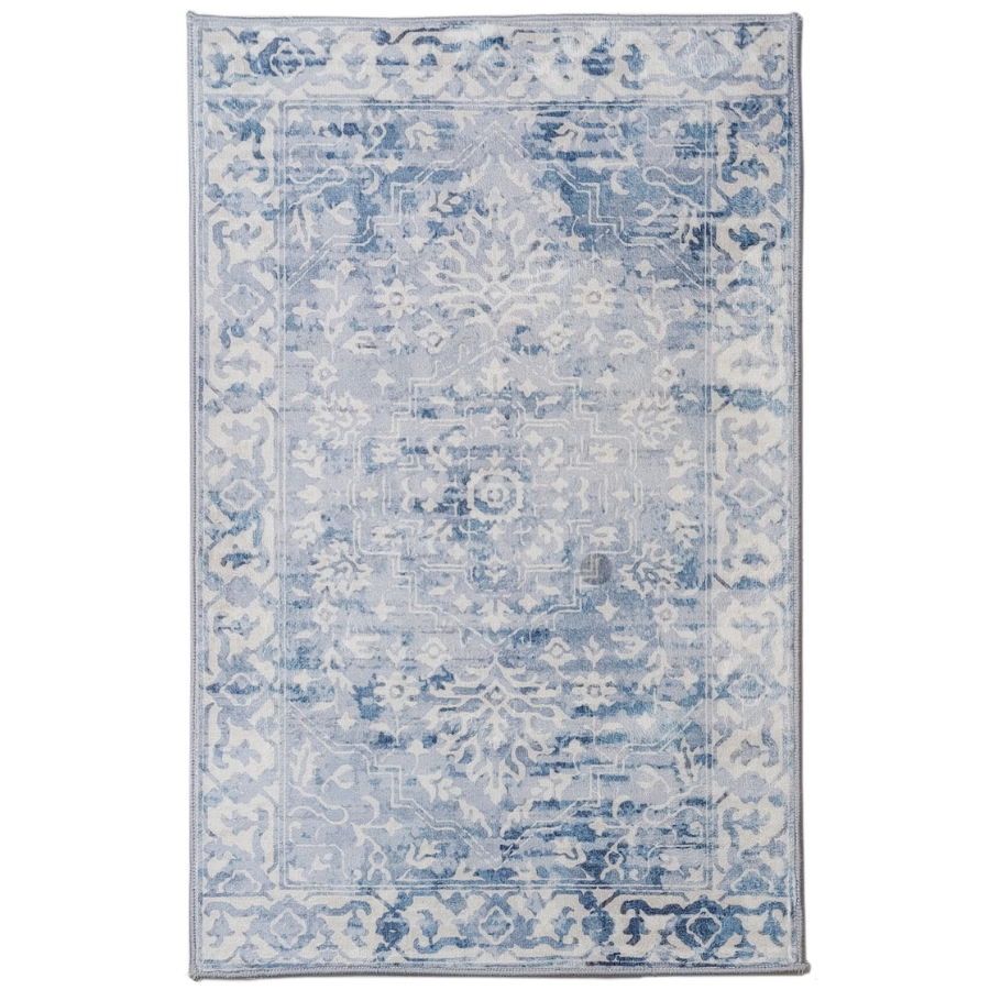 Decorative rug with blue and white pattern on a white background
