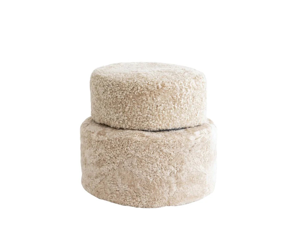 Two beige textured containers stacked on a white background