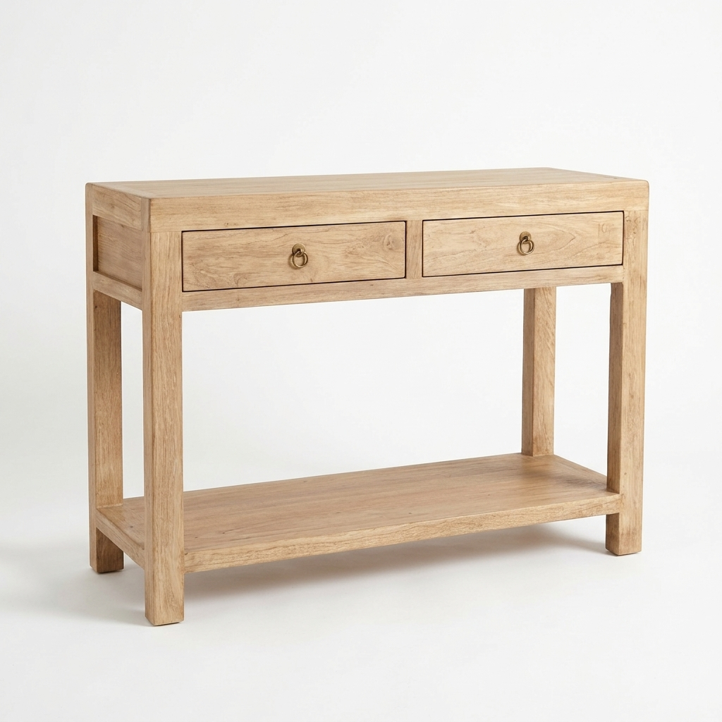 A light natural oak console table with two drawers, small round brass pulls, and an open lower shelf, shown on a clean white background.